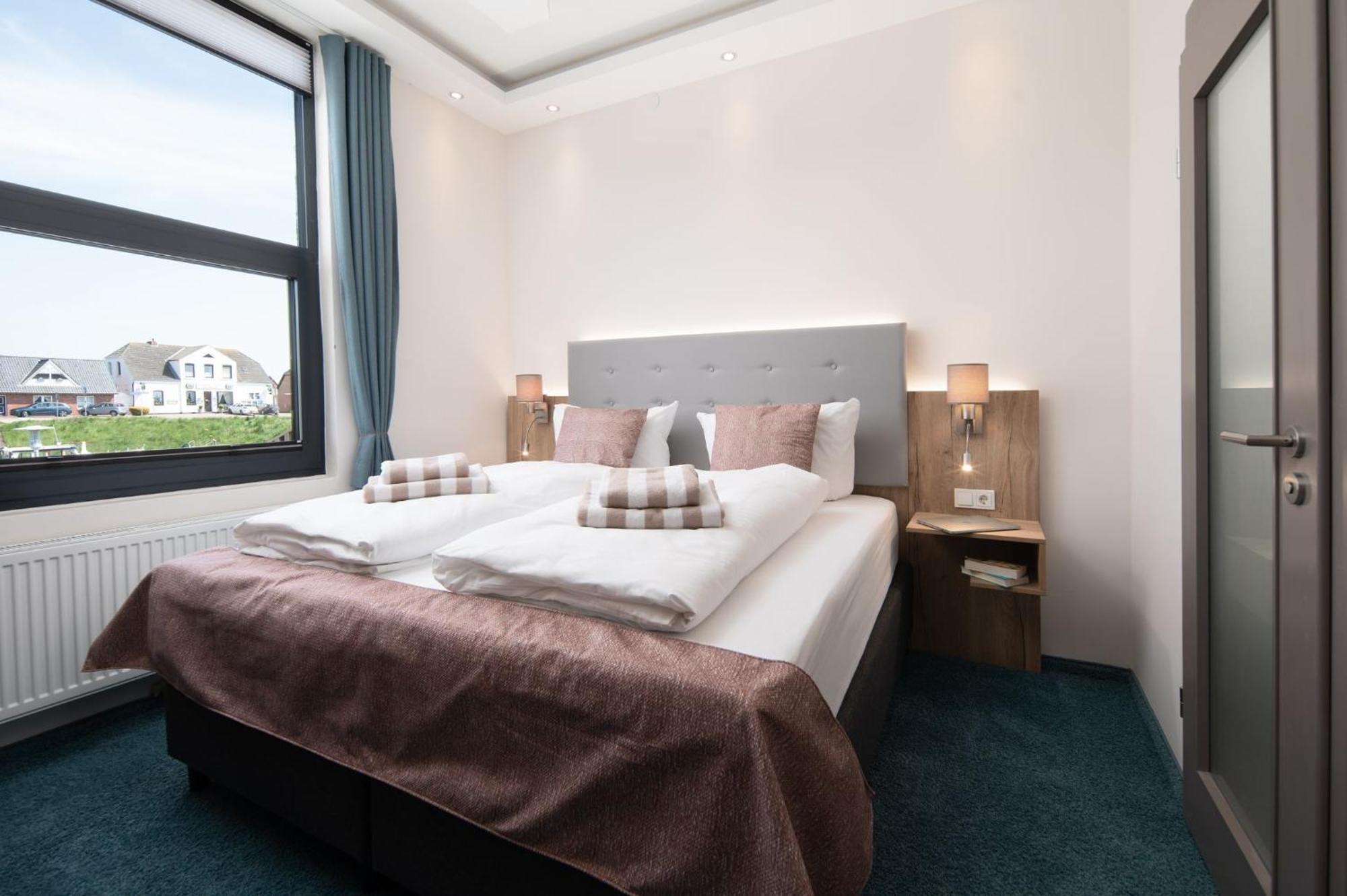 Nordseehotel Tausendschoen Carolinensiel Pokoj fotografie