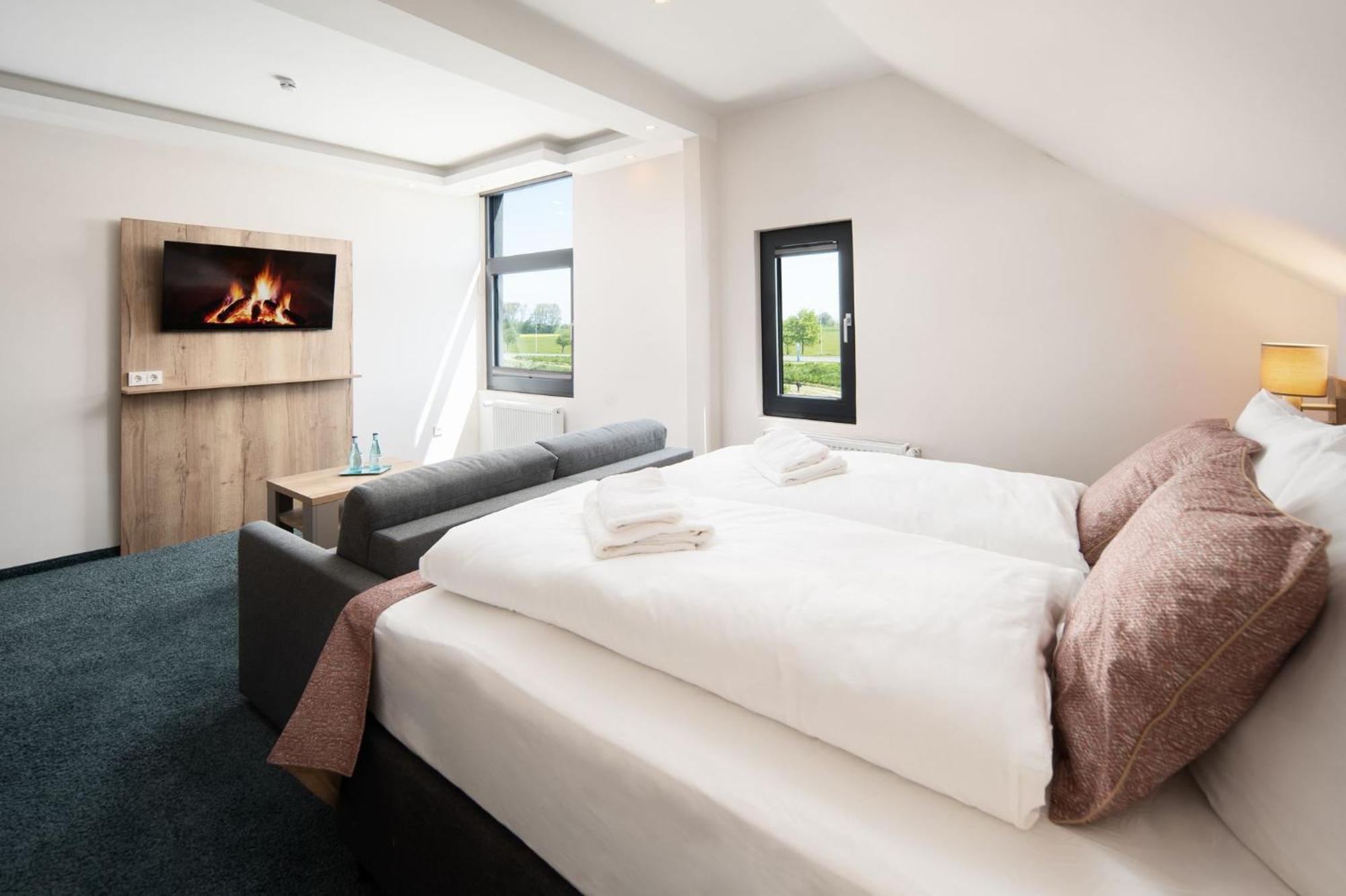 Nordseehotel Tausendschoen Carolinensiel Pokoj fotografie